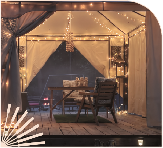 Canvas tent interior lit with string lights